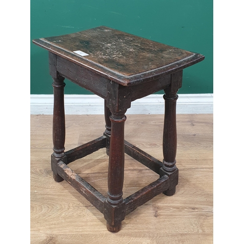 13 - An antique oak Joint Stool with moulded top on turned supports A/F 1ft 8in H x 1ft 5in W