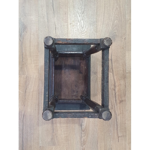 13 - An antique oak Joint Stool with moulded top on turned supports A/F 1ft 8in H x 1ft 5in W