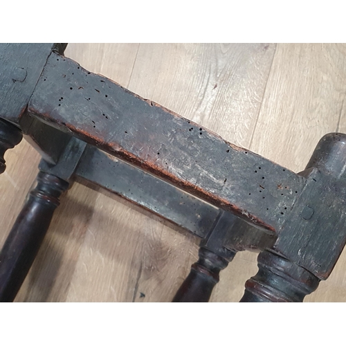 13 - An antique oak Joint Stool with moulded top on turned supports A/F 1ft 8in H x 1ft 5in W