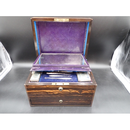 146 - A Victorian Coromandel Dressing Case containing silver lidded boxes and jars with finely engraved fl... 