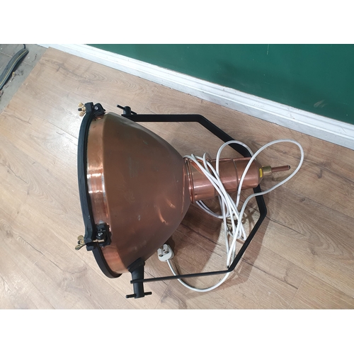 20 - A large copper Lantern type light supported on a metal bracket, 18in diam fitted for electricity