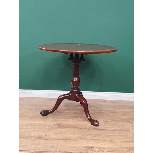 23 - A mahogany Pillar Table with carved top on bird cage support, baluster column and tripod base, 2ft 6... 