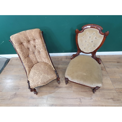 24 - A Victorian walnut framed shield back Chair with green button upholstery and a mahogany framed Nursi... 