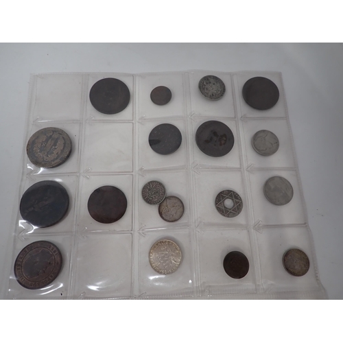 261 - A collection of World Coins to include North Borneo 1903 2½ Cents and 1920 5 Cents, Spain 1853 4 Rea... 