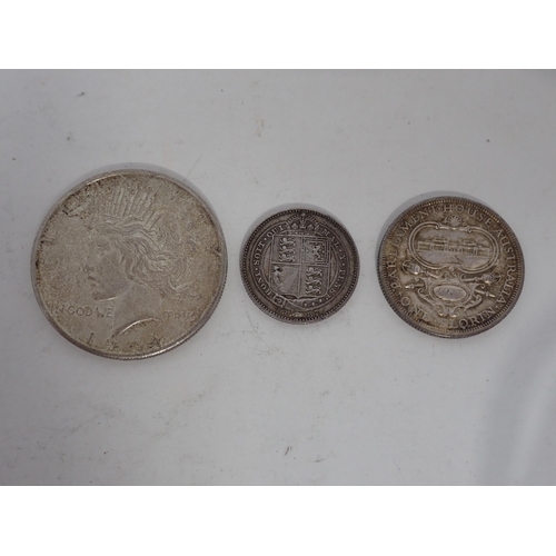 276 - A United States Peace Dollar 1922, Victorian Shilling 1887, three Australian Florins, minor silver I... 