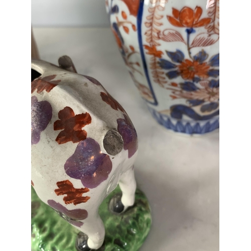 286 - A Staffordshire luster Cow Creamer, A/F, an Imari Jar and Cover, 10in H A/F and a Staffordshire Figu... 