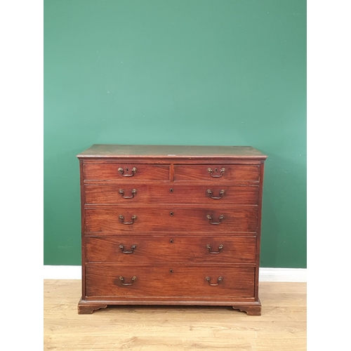 3 - A 19th Century large mahogany Chest of two short and four long graduated drawers supported on bracke... 