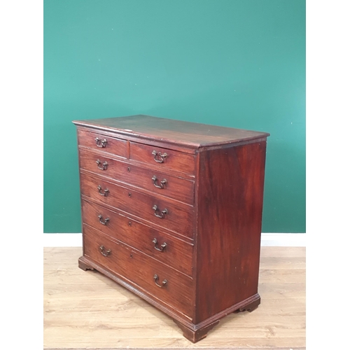 3 - A 19th Century large mahogany Chest of two short and four long graduated drawers supported on bracke... 