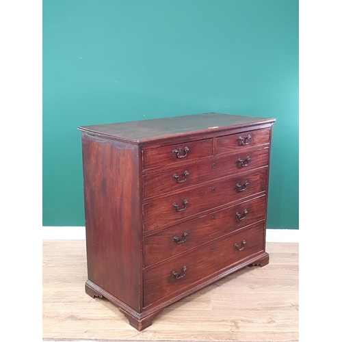 3 - A 19th Century large mahogany Chest of two short and four long graduated drawers supported on bracke... 