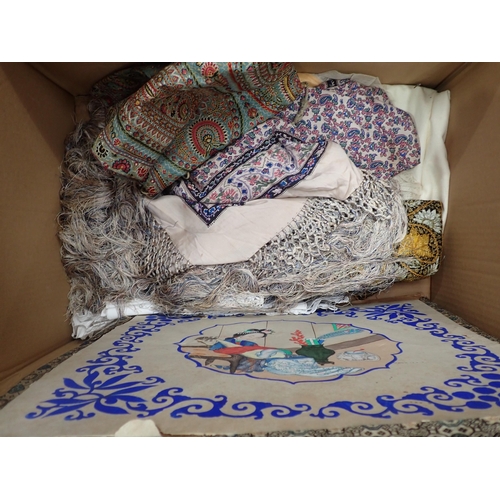 345 - A box of Table Cloths and Embroidered Textiles and Magazines