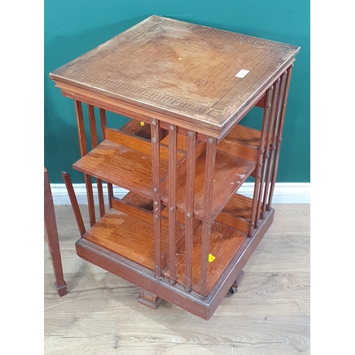 4 - An Edwardian Satinwood Revolving Bookcase with inlaid top on casters (A/F) 2ft 9