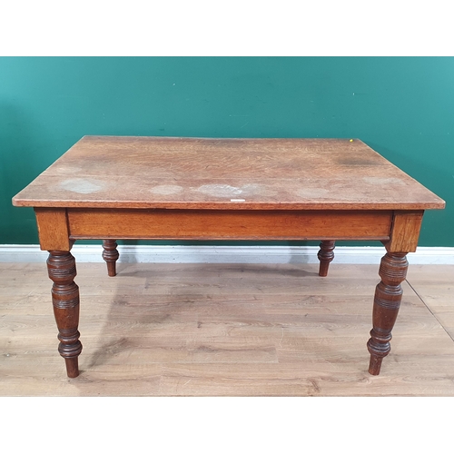 42 - A 19th Century oak Kitchen Table with plank top fitted frieze drawer (one frieze drawer missing) and... 