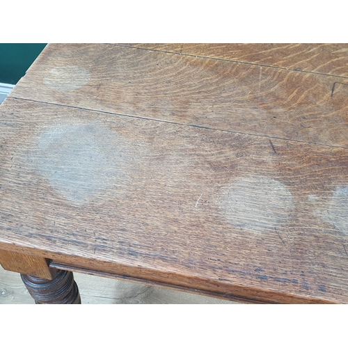 42 - A 19th Century oak Kitchen Table with plank top fitted frieze drawer (one frieze drawer missing) and... 