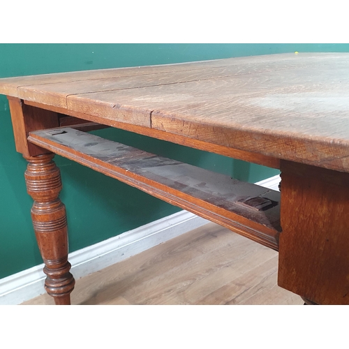 42 - A 19th Century oak Kitchen Table with plank top fitted frieze drawer (one frieze drawer missing) and... 