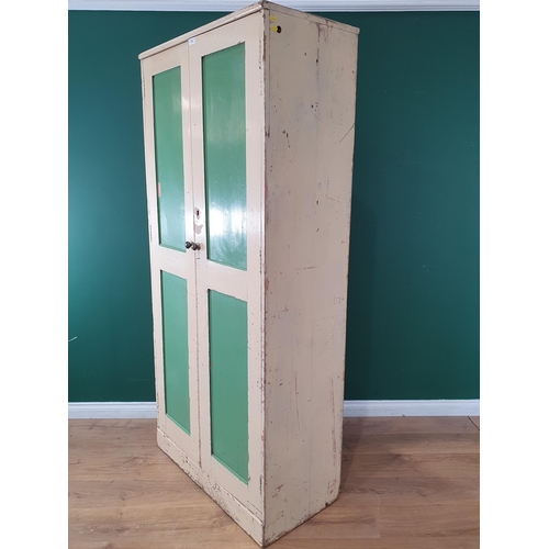 470 - An antique painted pine two door pantry Cupboard enclosing shelves, 6ft 6in H x 3ft W