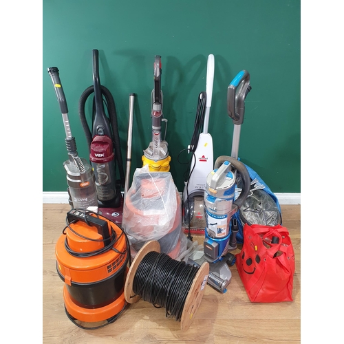 474 - Two Vax Vacuum Cleaners, a Bissell Carpet Washer, and two others