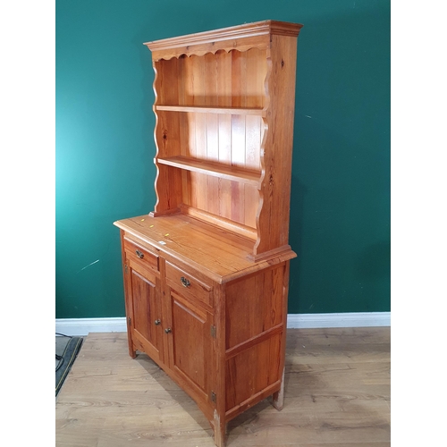 477 - A small pine Dresser fitted drawers and cupboard doors, 6ft H x 3ft 2in W