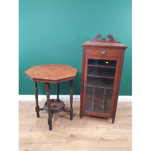 487 - A walnut Music Cabinet with raised back, fitted frieze drawer above a glazed door, 3ft 4in H x 1ft 8... 