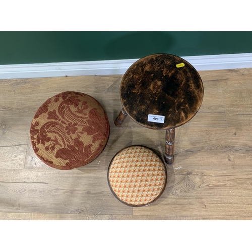 490 - A Milking Stool and two upholstered circular Footstools.