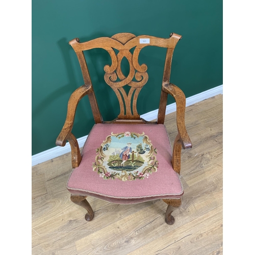 523 - A Georgian style oak Elbow Chair