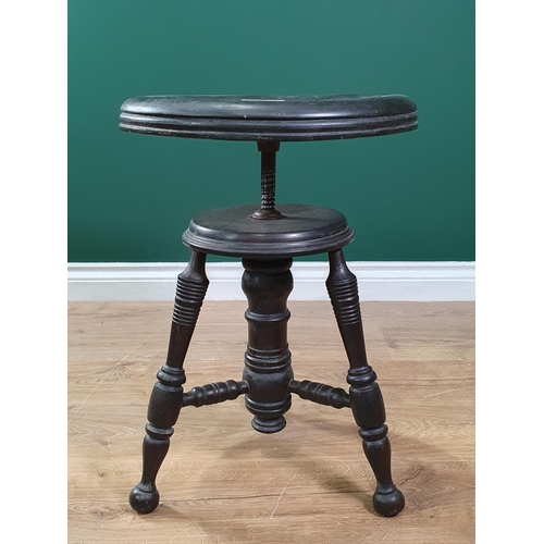 53 - An Aesthetic Movement style revolving Stool on three turned legs united by turned stretchers, The Ch... 