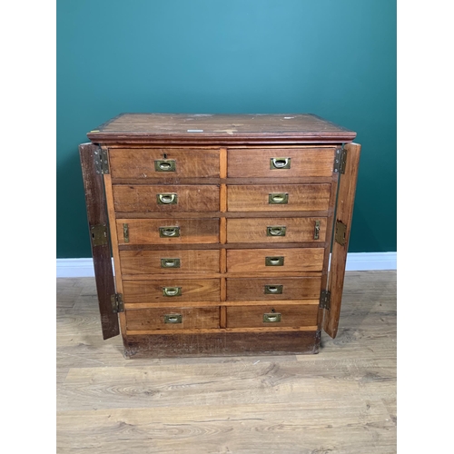 551 - An oak three tier Buffet fitted two drawers on barley twist supports, 3ft W x 3ft 3