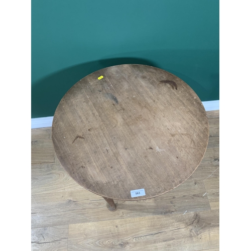 563 - A mahogany circular Occasional Table on three tapered supports, 2ft 2