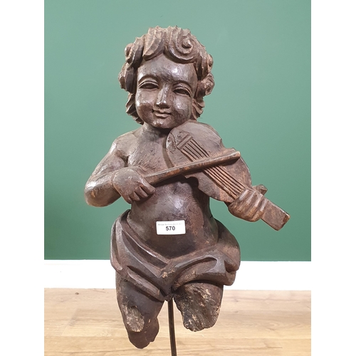 570 - A carved Sculpture of a Child Violinist on metal stand in the 18th Century style 2ft 5in H