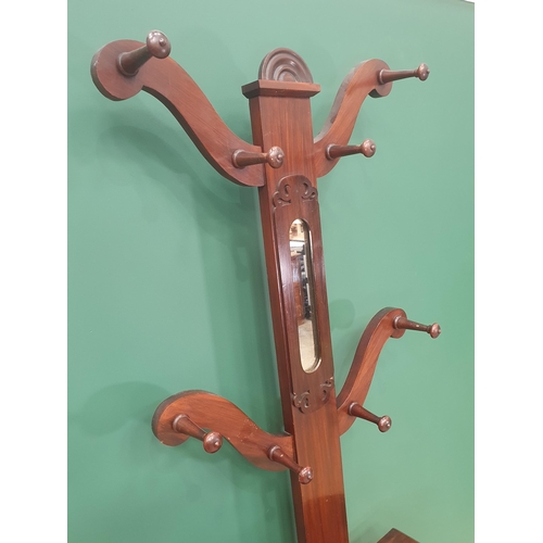 577 - A Victorian rosewood Hallstand with shaped arms and turned hooks 6ft 7in H x 2ft 4in W