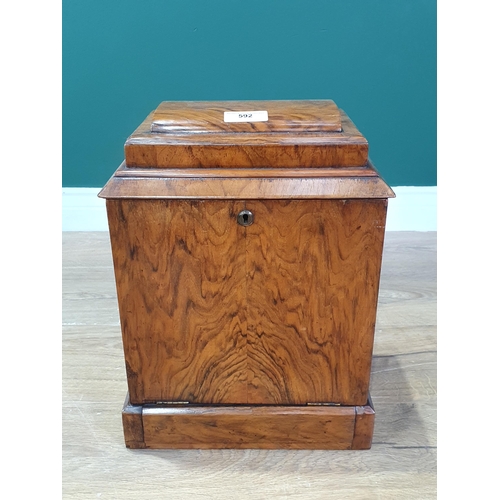 592 - A Victorian walnut Work Box with hinged lid enclosing sewing compartments, fall front with writing s... 