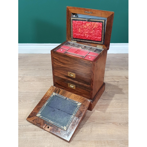 592 - A Victorian walnut Work Box with hinged lid enclosing sewing compartments, fall front with writing s... 