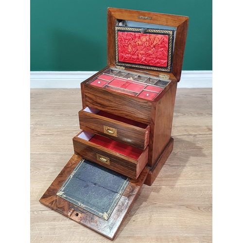 592 - A Victorian walnut Work Box with hinged lid enclosing sewing compartments, fall front with writing s... 