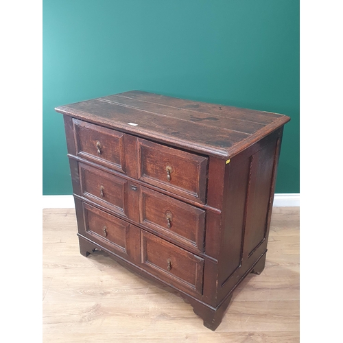 608 - An early 18th Century moulded oak Chest of three long drawers on shaped bracket feet 3ft 3in W x 3ft... 