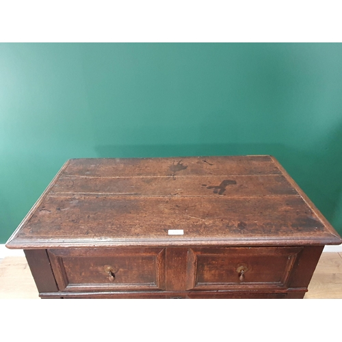 608 - An early 18th Century moulded oak Chest of three long drawers on shaped bracket feet 3ft 3in W x 3ft... 