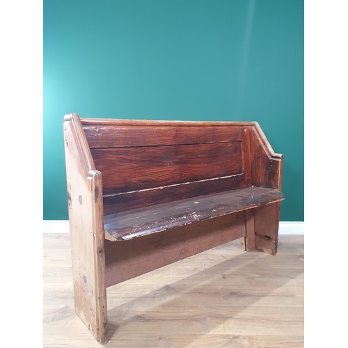 618 - A stained pine Pew 4ft 2in W x 2ft 10in H