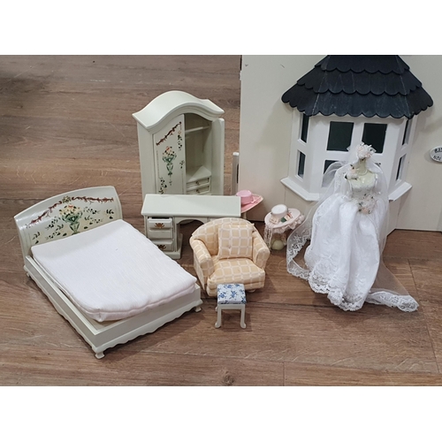 636 - A modern Dolls House with furniture and accessories