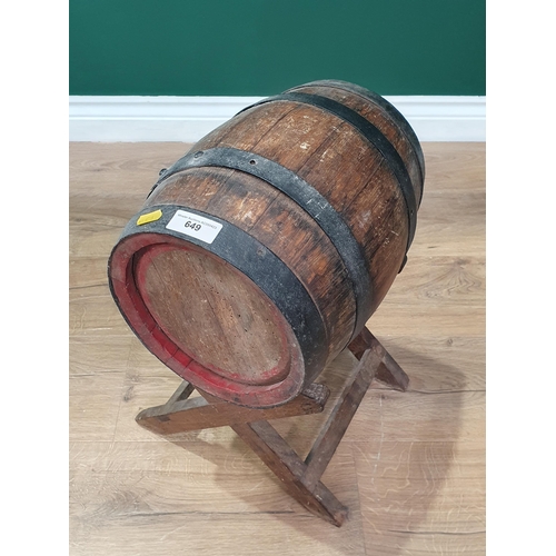 649 - A coopered oak Barrel on stand