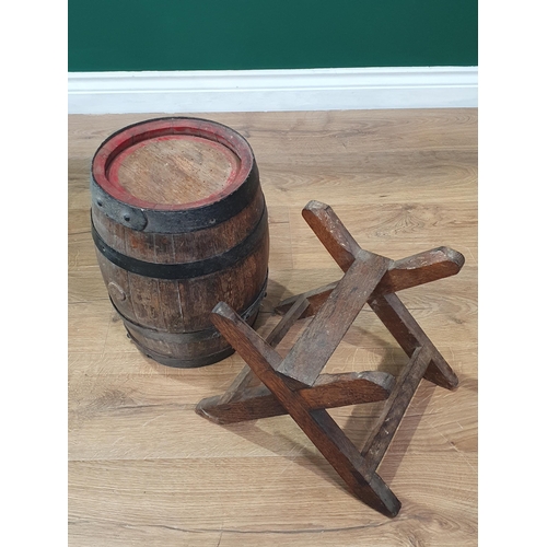 649 - A coopered oak Barrel on stand