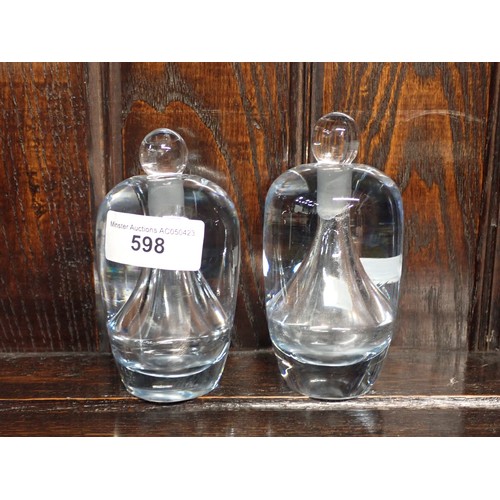 598 - A pair of Orrefors style heavy glass Scent Bottles and Stoppers, 5in