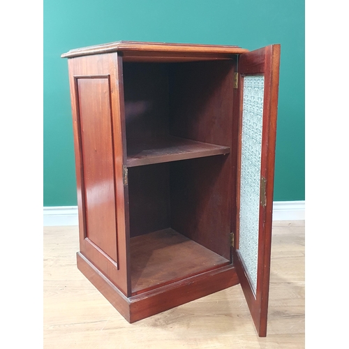 673 - A Victorian walnut Cabinet with single glazed door on plinth base 2ft 9in H x 1ft 7in W