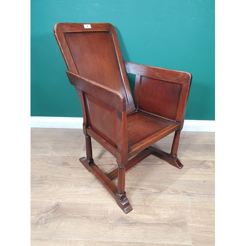 68 - An early 20th Century oak Arts and Crafts type Armchair of small proportions on turned and square fr... 