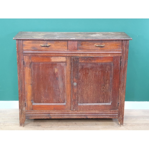 7 - A stained pine cupboard fitted two drawers above pair of cupboard doors 4ft W 3ft 3