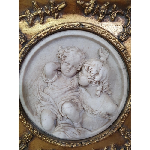 704 - Three Mirrors and a gilt framed Plaque of cherubs