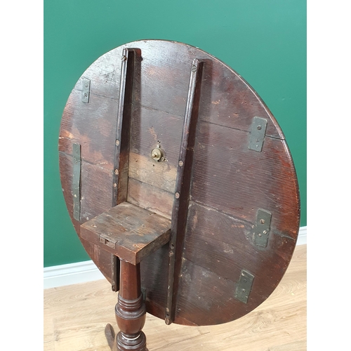 716 - An antique oak Pillar Table on barrel turned column and tripod base 2ft 7in D x 2ft 5in H