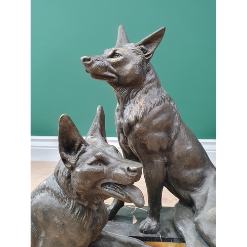 717 - A bronze effect Sculpture of two Alsatians on marble effect base signed L. Carvin 2ft 2in L x 1ft 4i... 