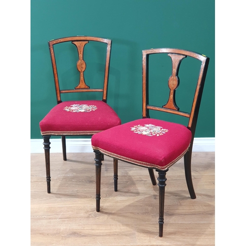 731 - A pair of Victorian walnut and ebonised Single Chairs on tapering fluted front legs with red stuff o... 