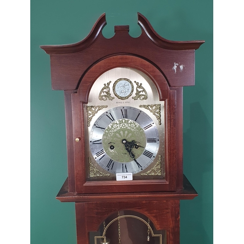 734 - A mahogany cased Grandmother Clock with silvered chapter ring and arched dial by Wood & Sons 5ft 7in... 