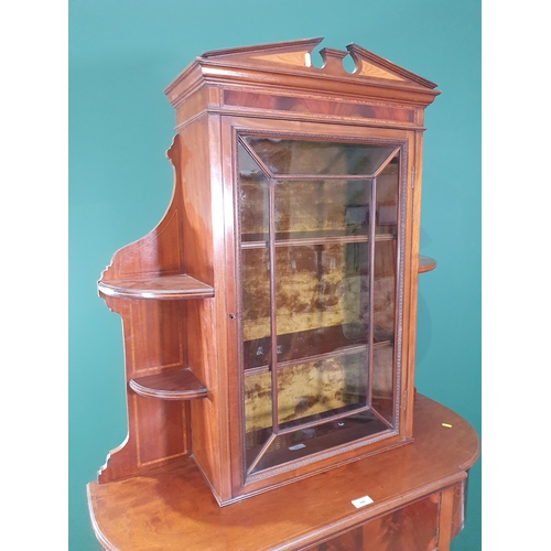 741 - An Edwardian mahogany Display Cabinet the glazed upper door above single cupboard, with satinwood st... 