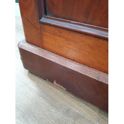 747 - A Victorian walnut glazed Bookcase, the base fitted drawers and cupboard doors on plinth base, 6ft 1... 