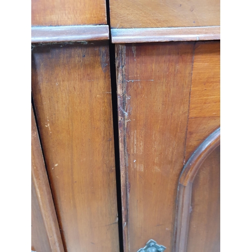 747 - A Victorian walnut glazed Bookcase, the base fitted drawers and cupboard doors on plinth base, 6ft 1... 